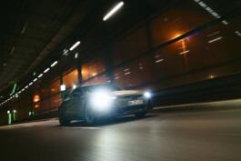 audi-rs-etron-gt_at-night-racing-through-urban-tunnel-motion-blur 