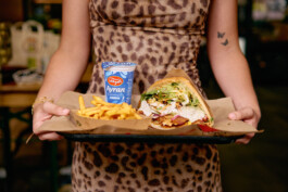 food-tray-with-ayran-kebap-doener-female-hands-leopard-print-tattoo 