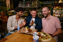 three-friends-celebrating-eating-together-kebap-ayran 